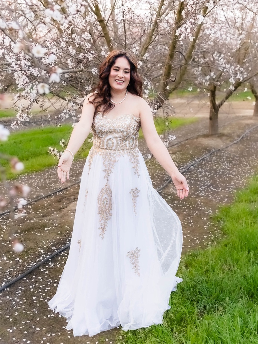 Elegant Strapless White Gown with Gold Embellished Bodice